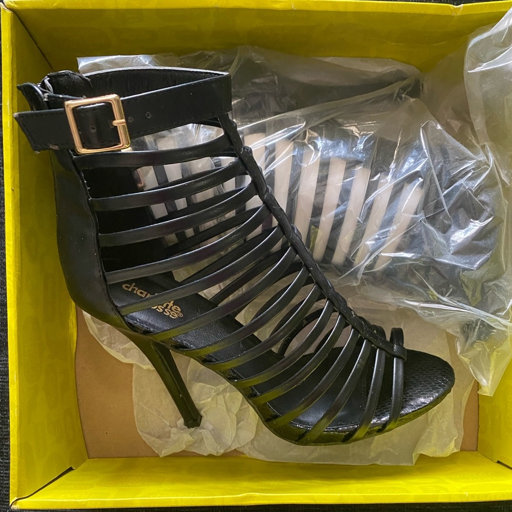 Black cage style open toe zip up heels